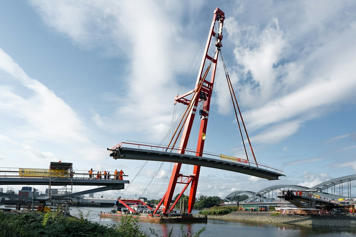 Crane lifting a bridge section